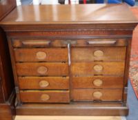 An oak tambour stationery cabinet marked 'Amberg's Cabinet Letter File' W.78cm
