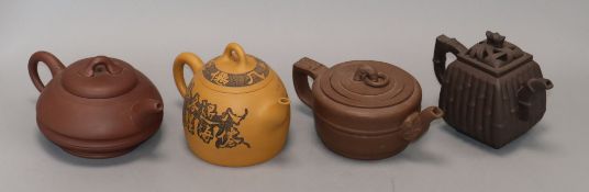 Four Yixing pottery teapots