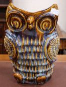 A pottery owl planter