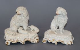 Two Staffordshire porcelain figures or groups of poodles, c.1835-50, possibly Dudson, one modelled