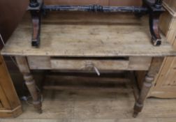 A 19th century pine side table W.106cm