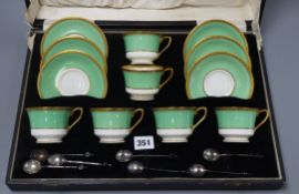 A Royal Worcester coffee set (six cups and saucers)