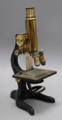 A Leitz lacquered brass and cast iron microscope