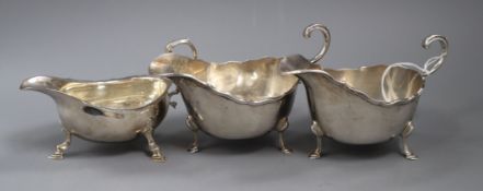 A pair of 1930's Asprey & Co silver sauceboats and one other sauceboat, 12.5 oz.