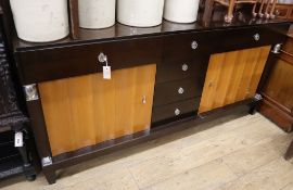 A contemporary 'Heritage' design two-colour sideboard by Selva, Italy, fitted four central short