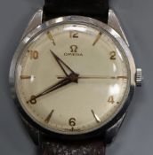 A gentleman's late 1950's stainless steel Omega manual wind wrist watch, movement c.284, on