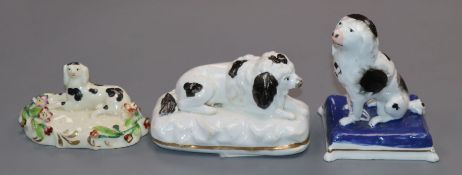 Three small Staffordshire porcelain groups of two poodles and a King Charles spaniel, c.1835-50, the