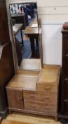 A Heals limed oak dressing table W.76cm