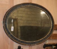 A 19th century oval wall mirror W.114cm