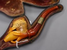 A cased meerschaum pipe