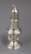 A George III silver caster by Charles Hougham, London 1791, 15.2cm.