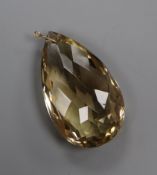 A large facet cut teardrop shaped citrine pendant, 53mm.