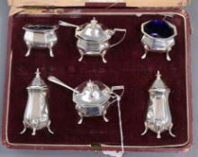 A 1920's cased six piece silver condiment set by Alexander Clark & Co Ltd, Birmingham.