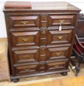 A Jacobean oak block front chest, fitted four long drawers W.105cm