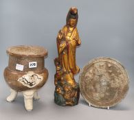 A Chinese crackle glaze tripod censer, a giltwood figure of Guanyin and a cast metal mirror