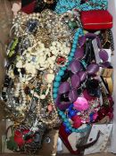 A large quantity of assorted costume jewellery.