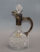 A silver mounted cut glass claret jug height 29cm