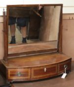 A George III inlaid mahogany toilet mirror W.76cm