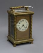 A late 19th century French brass cased eight day carriage timepiece