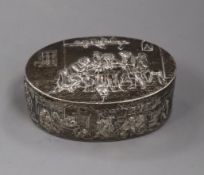 A late 19th century Hanau embossed white metal oval box with hinged cover, Georg Roth & Co, 10cm.