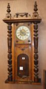 A Victorian walnut wall clock H.100cm approx.