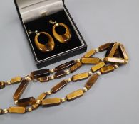 A 14k yellow metal and tiger's eye quartz baton set necklace with fluted spacers and pair of similar