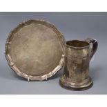 A silver mug, Sheffield 1938, maker Roberts & Belk and a silver presentation waiter, Birmingham