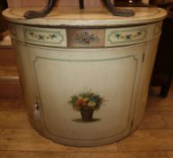 A cream painted demi-lune cabinet W.107cm