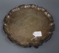 A silver salver with piecrust edge, Birmingham 1937, I. S. Greenberg & Co, approx. 40 oz.