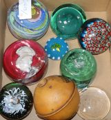 A collection of glass paperweights and a Mauchline string box