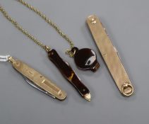 An Aspreys 9ct gold penknife, another 9ct gold penknife and a tortoiseshell example with gold and
