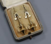 A near pair of ornate 19th century yellow metal drop earrings, (French small guarantee and import