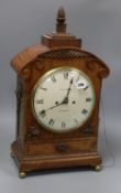 A Victorian carved mahogany mantel clock, F. Dorrington, Devonport, with double fusée repeating