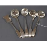 Four assorted Victorian Scottish silver toddy/cream ladles and a similar spoon with shovel shaped