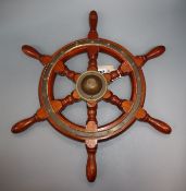 A small Simpson Lawrence teak ship's wheel length 51cm