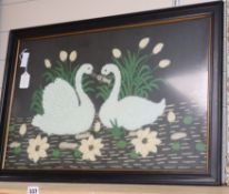 A beadwork and fabric panel of two swans 43 x 57cm excluding frame