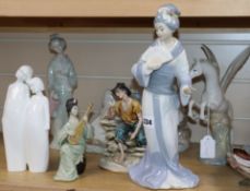 A group of Doulton, Nao, etc. porcelain figures