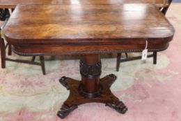 An early Victorian rosewood folding tea table W.101cm