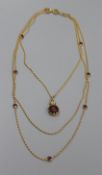A Victorian gilt metal and paste set guard chain with paste set intaglio pendant, pendant 37mm.