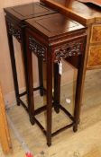 A pair of Chinese hardwood stands W.27cm