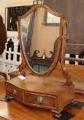A George III serpentine box base toilet mirror W.46cm