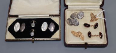 A pair of 15ct gold navette-shaped cufflinks, a garnet-set pair, a silver pair and a silver and