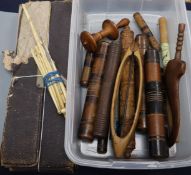 A group of 19th century ivory knitting needles, crochet sticks and treen cases