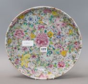 A Chinese famille rose 'thousand flower' pattern dish, Republic period with Qianlong mark,