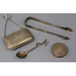 A silver purse on chain (Chester), a silver circular compact, a pair of silver sugar tongs and a