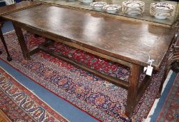 An oak refectory table W.216cm