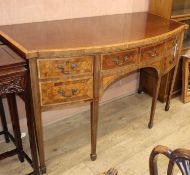 An inlaid mahogany bow front sideboard W.146cm