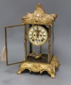 An American four glass rococo clock height 37cm