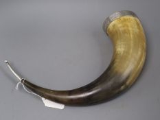 A white metal mounted cow horn, 19th century