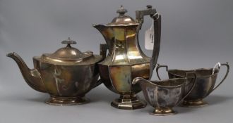 A matched four-piece octagonal silver tea service, Birmingham 1915 and 1932, approx. gross 48 oz.